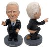 Biden pooping bobblehead prank